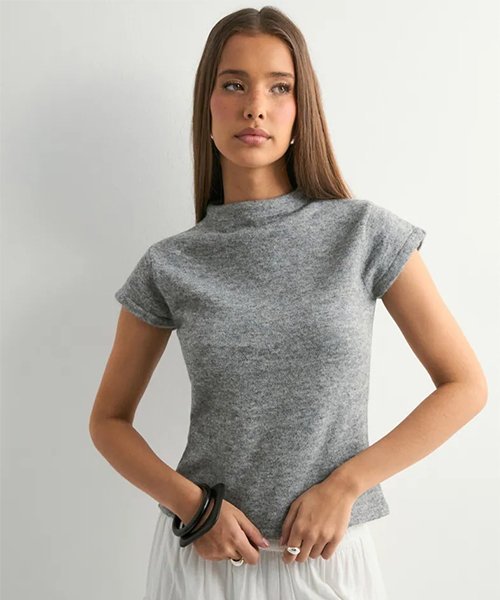 2) A minimal knit top (crewneck or mock neck, good fabric)