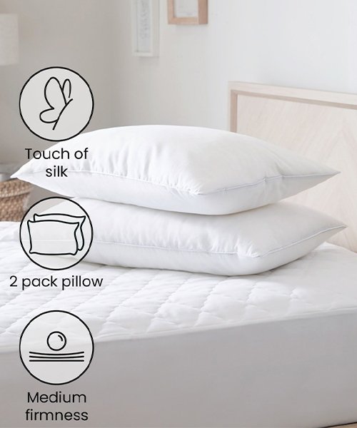 Two supportive pillows (or new pillow inserts)